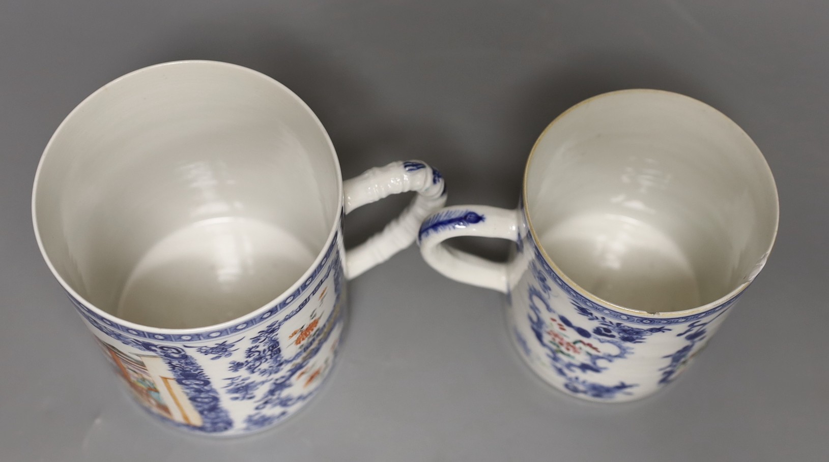 Two late 18th century Chinese exports famille rose mugs, tallest 12cm (2)